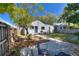 The private backyard has a concrete patio and mature landscaping at 204 E Harvard St, Orlando, FL 32804