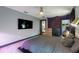 Well-lit bedroom with a comfortable bed, contemporary design, and ceiling fan at 204 E Harvard St, Orlando, FL 32804