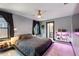 Cozy bedroom features a comfortable bed, contemporary design and ceiling fan at 204 E Harvard St, Orlando, FL 32804