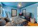 Stylish bedroom featuring hardwood floors, a ceiling fan, and a large dresser at 204 E Harvard St, Orlando, FL 32804