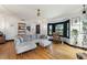 Comfortable living room features hardwood floors and an abundance of natural light at 204 E Harvard St, Orlando, FL 32804