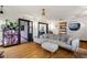 Spacious living room boasts hardwood floors and is filled with natural light at 204 E Harvard St, Orlando, FL 32804