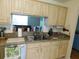 Kitchen stainless-steel sink and granite counters at 2160 Addison Ave, Clermont, FL 34711