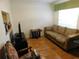 Cozy living room with natural light and comfortable seating at 2160 Addison Ave, Clermont, FL 34711