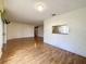 Spacious living room with hardwood floors and a view to the Kitchen at 2160 Addison Ave, Clermont, FL 34711