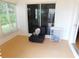 Enclosed patio features natural light and additional storage, adding functionality to the space at 2160 Addison Ave, Clermont, FL 34711