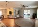 Open floor plan showcases the living room, kitchen, and adjacent sunroom at 222 Palmer Park Ln, Davenport, FL 33897
