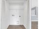 Laundry closet with tile flooring and hookups at 2794 Club Cortile Cir # B, Kissimmee, FL 34746