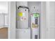 Utility closet with water heater and HVAC system at 2794 Club Cortile Cir # B, Kissimmee, FL 34746