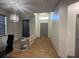 Entryway showcases a modern front door, accent window, and stylish lighting at 3100 Rocky River Rd, Kissimmee, FL 34746