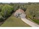 Aerial view of the home showcasing lush surroundings and a well-manicured lawn at 3193 Verbena Ct, Deltona, FL 32725