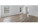 Bedroom with wood-style floors and natural light from two windows at 3193 Verbena Ct, Deltona, FL 32725