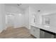 Bright kitchen featuring stainless steel appliances and a quartz countertop at 3193 Verbena Ct, Deltona, FL 32725