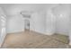 Spacious living room featuring wood floors and a view into the kitchen area at 3193 Verbena Ct, Deltona, FL 32725