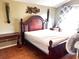 Comfortable bedroom with hardwood floors and natural light at 326 Hanging Moss Rd, Davenport, FL 33837