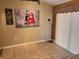 Inviting dining area with tile flooring and a large art piece at 326 Hanging Moss Rd, Davenport, FL 33837