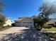 Charming home featuring a well-maintained yard, tile roof, and a spacious three-car garage at 3557 Valleyview Dr, Kissimmee, FL 34746