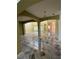 Spacious living room with arches, high ceilings, and marble tile floors, offering an open floor plan at 3557 Valleyview Dr, Kissimmee, FL 34746