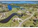 Beautiful waterfront property featuring lush landscaping, mature trees, and serene water views at 3607 Hidden River Ln, Tavares, FL 32778