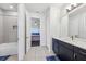 Bathroom featuring an ensuite bath, vanity and walk-in shower at 3607 Hidden River Ln, Tavares, FL 32778