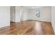 Bright bedroom featuring hardwood floors and neutral wall colors at 3607 Hidden River Ln, Tavares, FL 32778