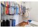Walk-in closet with ample storage space and well-organized clothing racks and shelves at 3607 Hidden River Ln, Tavares, FL 32778