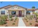 Beautiful single-story home with landscaped front yard and a welcoming entrance at 3607 Hidden River Ln, Tavares, FL 32778