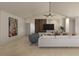 Inviting living room with vaulted ceilings, modern furnishings, and stylish decor, creating a comfortable atmosphere at 3607 Hidden River Ln, Tavares, FL 32778