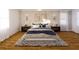 Bright bedroom featuring hardwood floors, contemporary decor, and stylish lighting at 3607 Hidden River Ln, Tavares, FL 32778