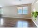 Spacious room with hardwood floors, a chandelier, and bright, neutral paint at 3709 Cedar Hammock Trl, St Cloud, FL 34772