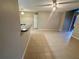 Neutral living room with tile flooring and ceiling fan at 401 Fountainhead Cir # 155, Kissimmee, FL 34741