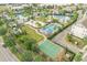 A resort-style community features multiple pools, a volleyball court, and a basketball court at 7059 Nemours Pkwy, Orlando, FL 32827