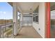 Balcony features metal railings and columns at 7059 Nemours Pkwy, Orlando, FL 32827