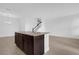 Stylish kitchen island with beautiful countertops and cabinetry at 7059 Nemours Pkwy, Orlando, FL 32827
