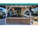 Enjoy the convenience of the outdoor bar with a drink menu, perfect for a relaxing poolside experience at 7673 Heritage Crossing Way # 301, Reunion, FL 34747