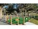 Scenic mini golf course featuring challenging obstacles and lush landscaping, perfect for Gathering fun and recreation at 7673 Heritage Crossing Way # 301, Reunion, FL 34747