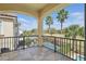 Beautiful balcony featuring a tile floor and gorgeous views of the pool and lush landscaping at 785 Desert Mountain Ct, Reunion, FL 34747