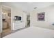 Bright bedroom featuring plush carpet and access to both the bath and upstairs hall at 785 Desert Mountain Ct, Reunion, FL 34747