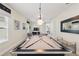 Pool table in game room with stylish lighting, seating area, and decor for entertainment at 785 Desert Mountain Ct, Reunion, FL 34747
