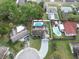 An inviting home with a sparkling blue pool and a lush, green backyard in a well-kept neighborhood at 7924 Coot St, Orlando, FL 32822