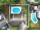 A beautiful home with a blue pool, nestled in a cozy, fenced backyard, perfect for relaxation and outdoor enjoyment at 7924 Coot St, Orlando, FL 32822