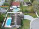 Comfortable home featuring a private backyard with a sparkling pool and a well-kept lawn for outdoor enjoyment at 7924 Coot St, Orlando, FL 32822