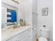 Bathroom with a sink, toilet, and shower, providing a functional and clean space at 7924 Coot St, Orlando, FL 32822