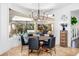 Cozy dining area overlooking the pool and outdoor living space at 808 Golfpark Dr, Celebration, FL 34747