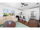 Open concept living area featuring a sofa and stainless steel refrigerator at 808 Golfpark Dr, Celebration, FL 34747