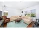 Bright living room with neutral furniture and modern decor at 808 Golfpark Dr, Celebration, FL 34747