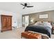 Spacious main bedroom with a sitting area, walk-in closet, and ensuite bathroom at 808 Golfpark Dr, Celebration, FL 34747
