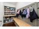 Well-organized mudroom with built-in storage and seating at 808 Golfpark Dr, Celebration, FL 34747