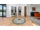 Open foyer boasts tile floors, arched doorways, and a decorative medallion at 8437 Lake Burden Cir, Windermere, FL 34786