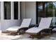 Inviting patio featuring comfortable lounge chairs for relaxing outdoors at 8437 Lake Burden Cir, Windermere, FL 34786